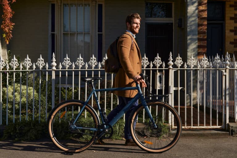 Man with Amsterdam Bike smiling